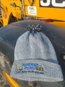 New style beanie hats available with all new hires